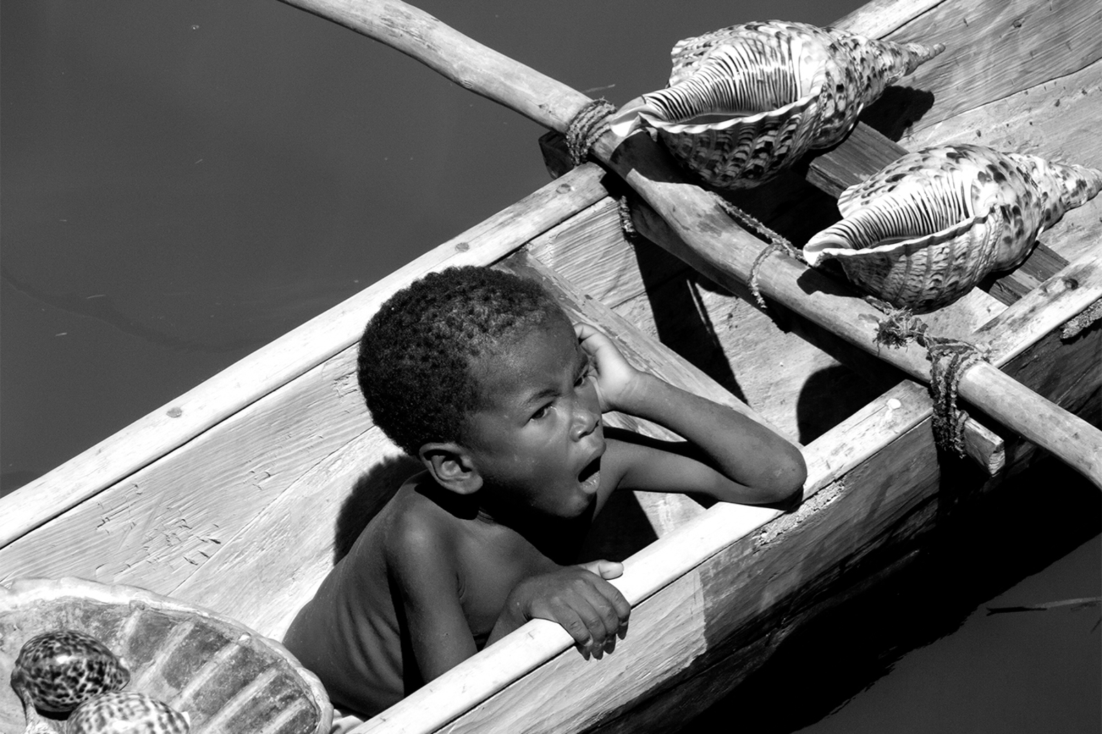 Boy in Canoe, by Kevin Simpson