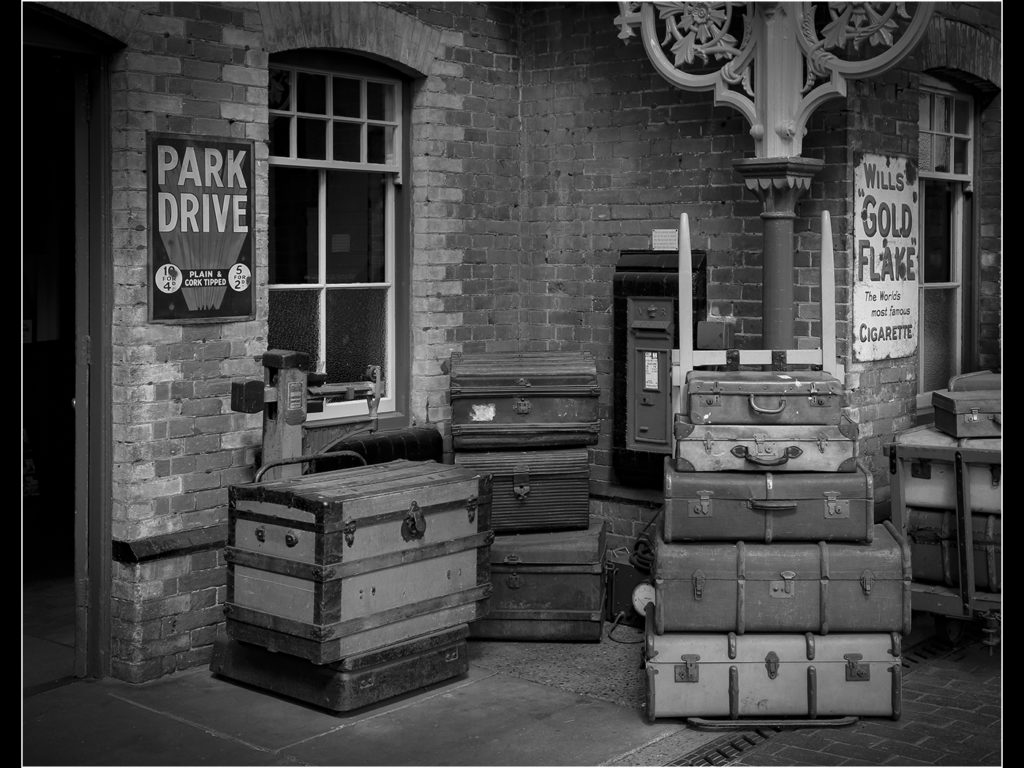 an image of an old country train station luggage room