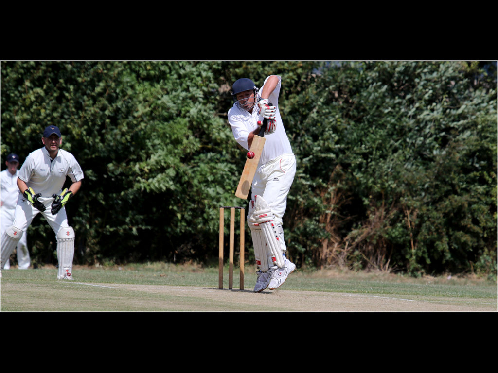 an image of a batsman striking the ball