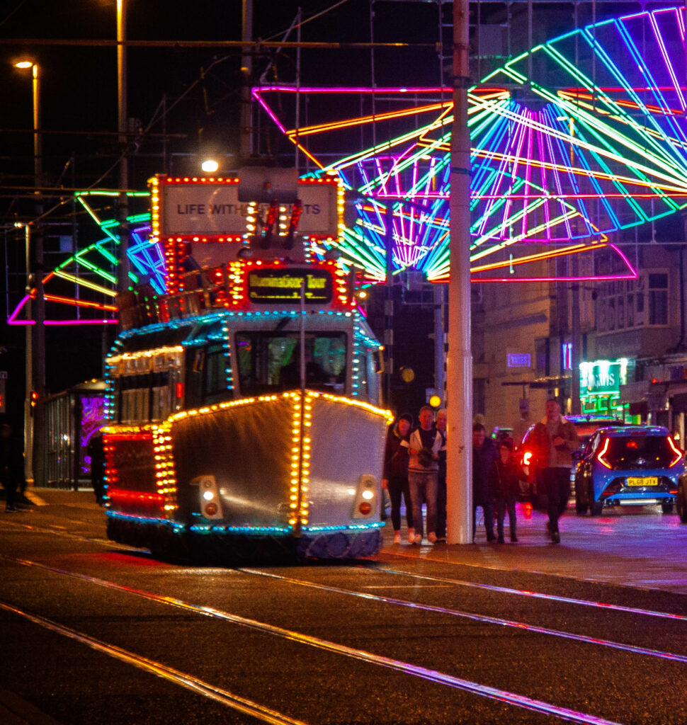 Illuminated Tram, by Derek King